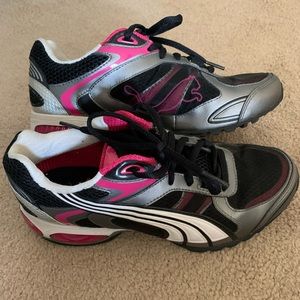 Pink, black, and silver Puma Running sneakers